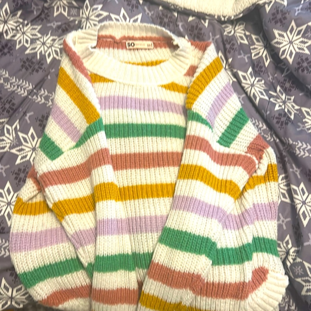 STRIPED KNITTED SWEATER.